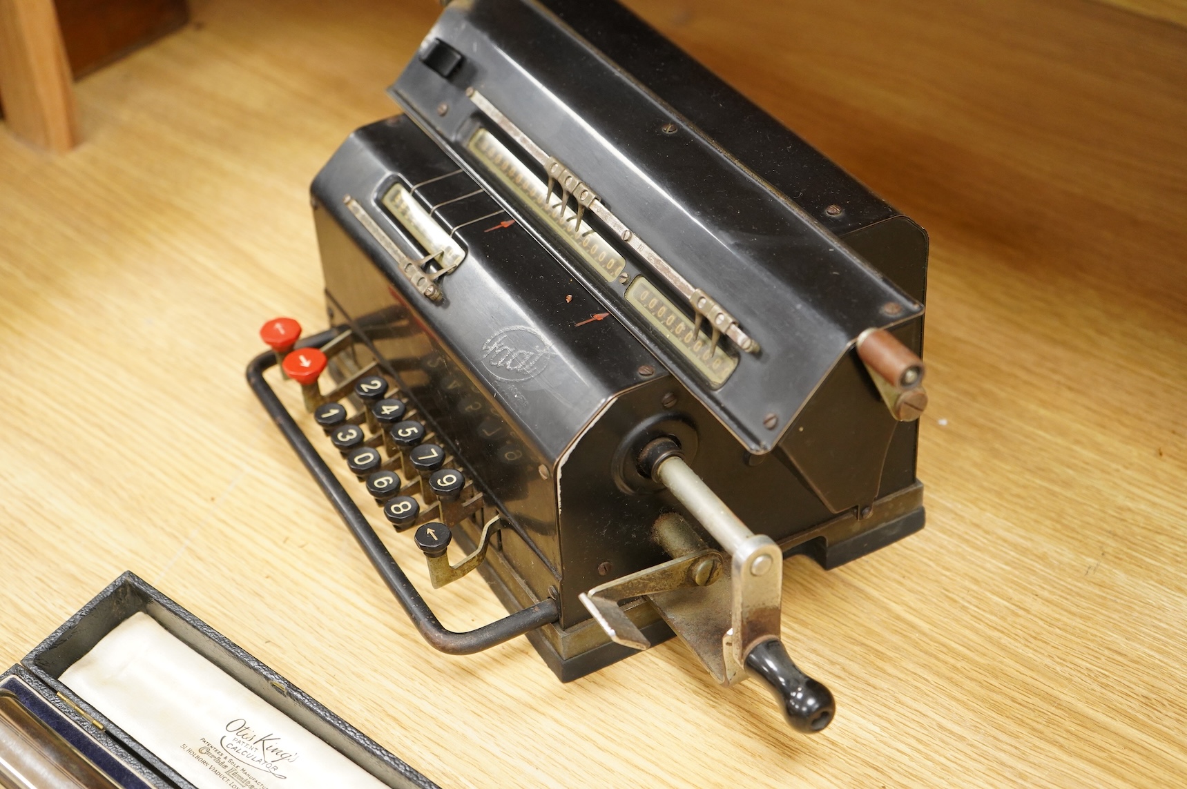 A Swedish Facit mechanical adding calculating machine, together with an Otis King’s calculator, model K, cased, (2).